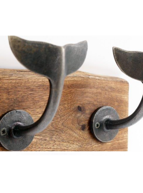 Four Whale Hooks on Wooden Plinth