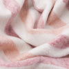 Beechwood Throw Camellia Close-up of pink and white checkered fabric