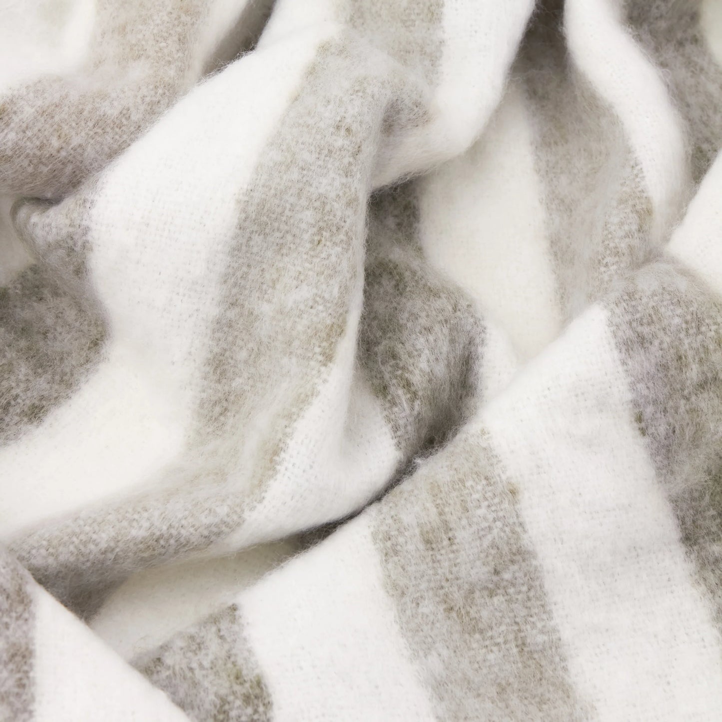 beechwood throw heath Close-up of textured fabric with neutral tones