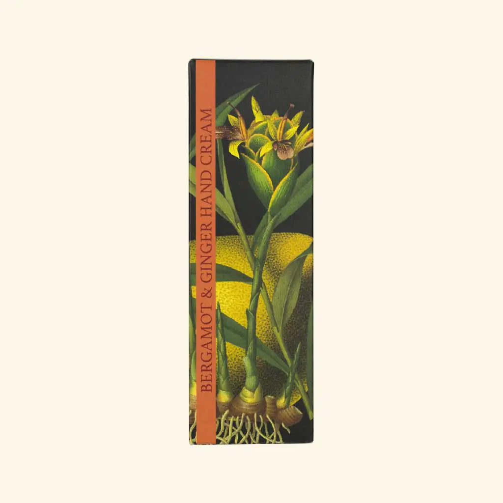 Hand cream packaging with botanical design and text on a beige background