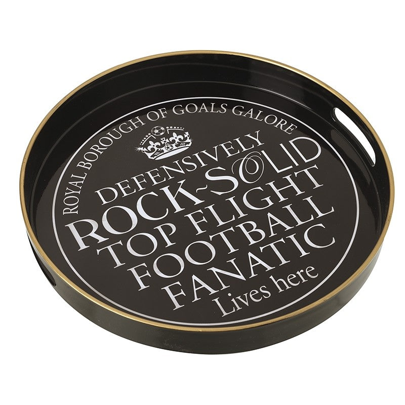 Black tray with white text and gold rim on a white background