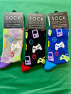Three pairs of colorful gaming-themed socks