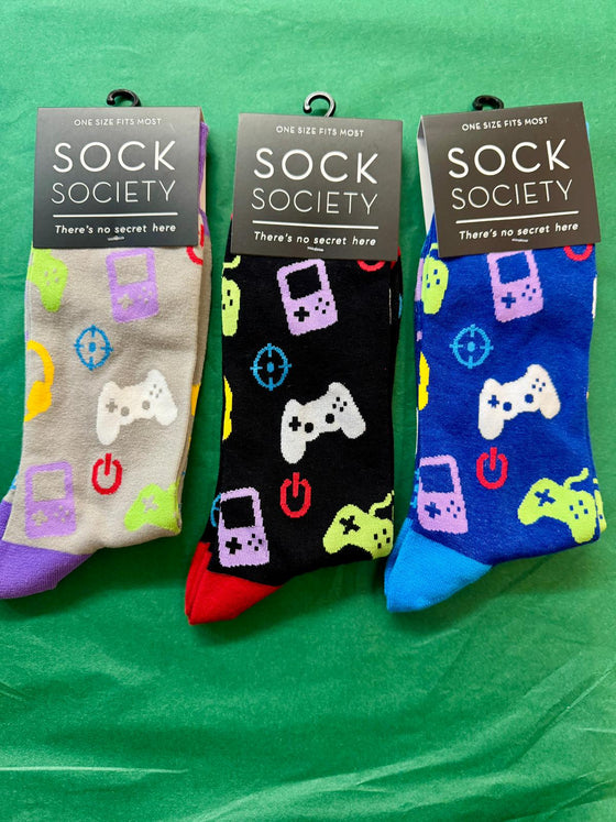 Three pairs of colorful gaming-themed socks