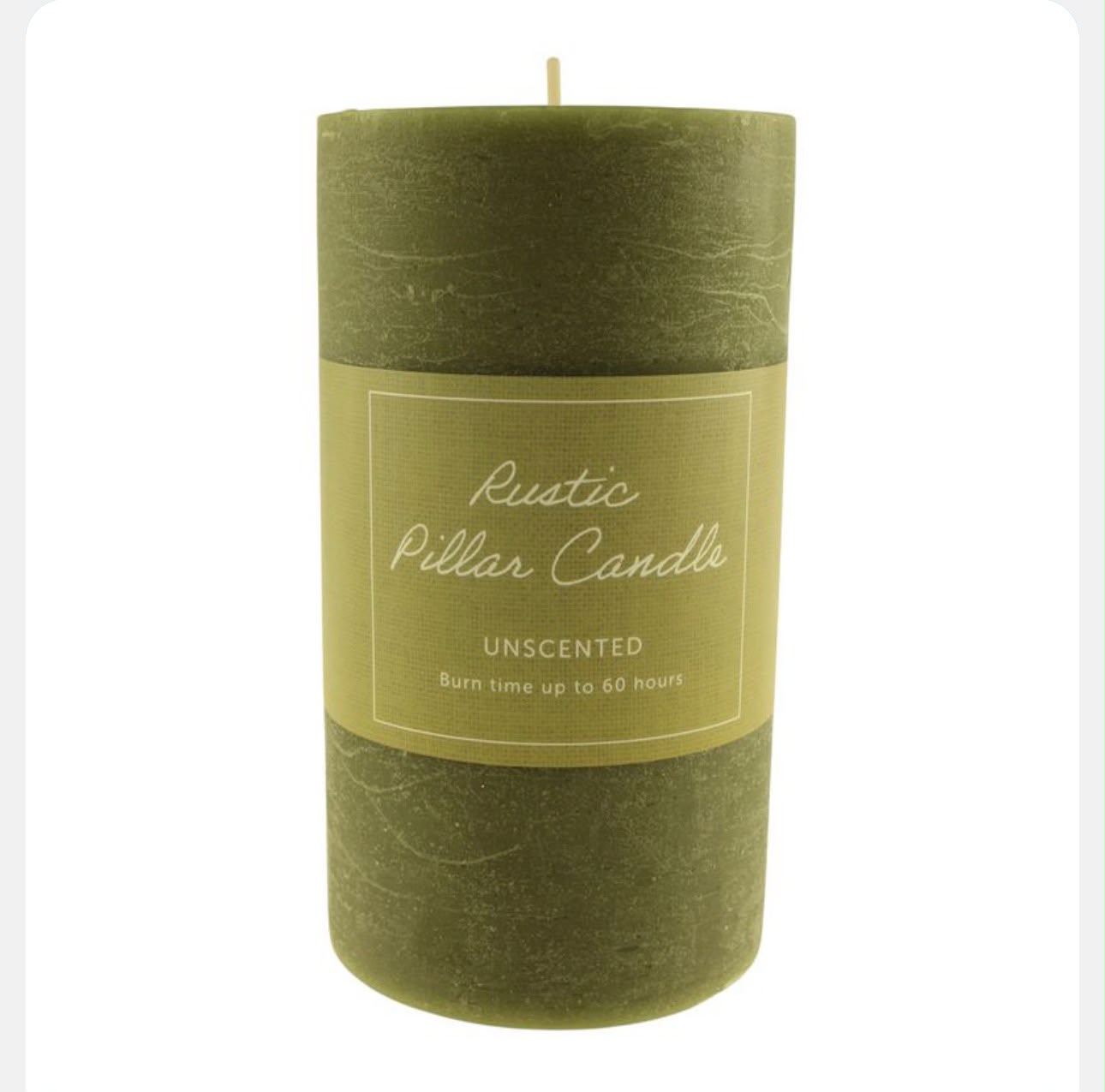 Green pillar candle with a label on a white background