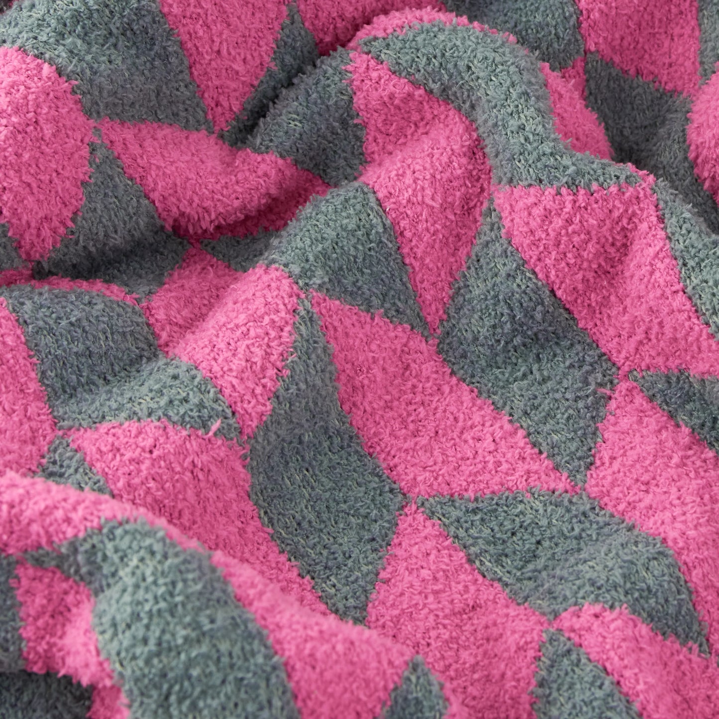 Close-up of pink and gray woven fabric pattern