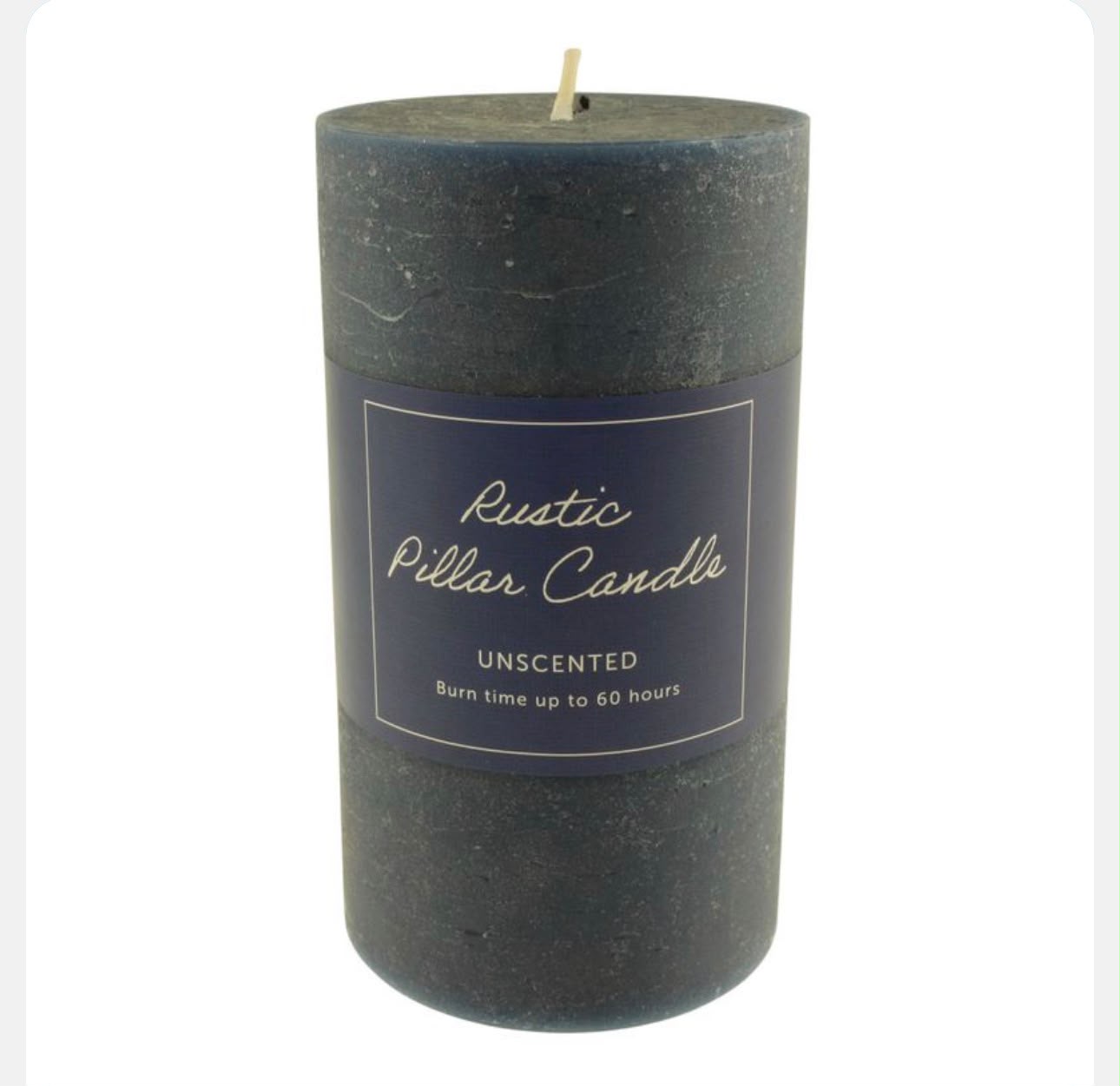 Blue rustic pillar candle with a label on a white background