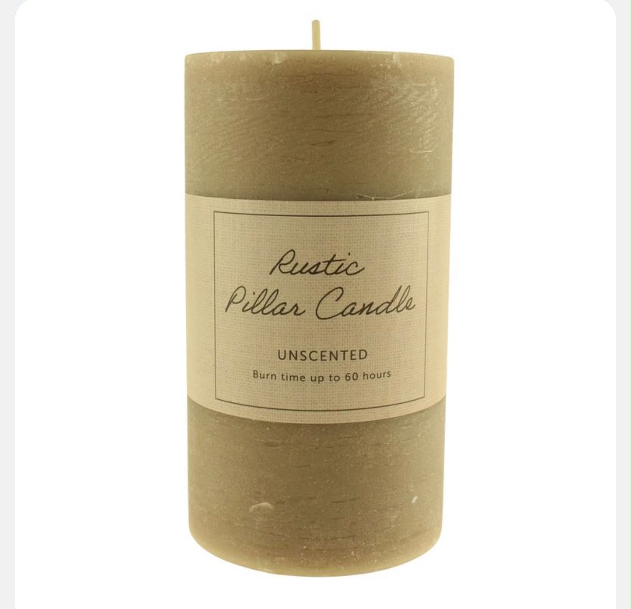 Rustic pillar candle with a label on a white background