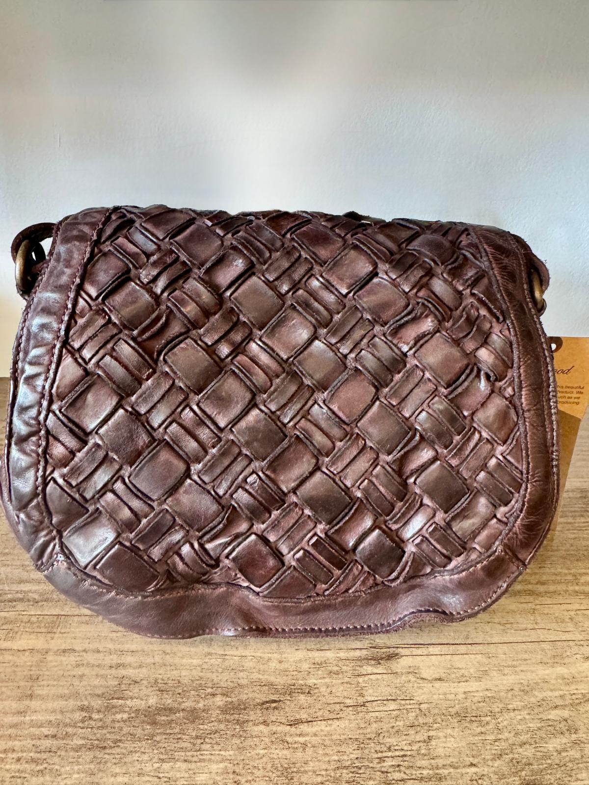 woven leather saddle flap bag brandy