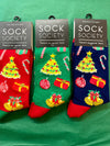 Three pairs of Christmas-themed socks 