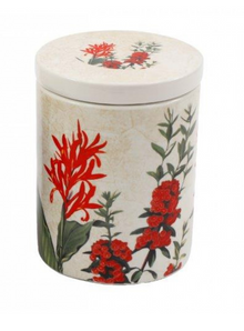  Decorative ceramic jar with floral design on a white background