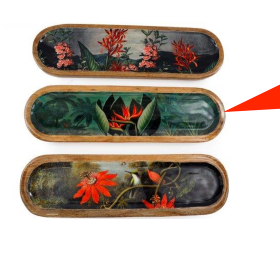 Three oval wooden trays with floral designs on a white background