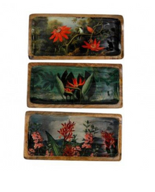  Three rectangular wooden tiles with floral designs on a white background