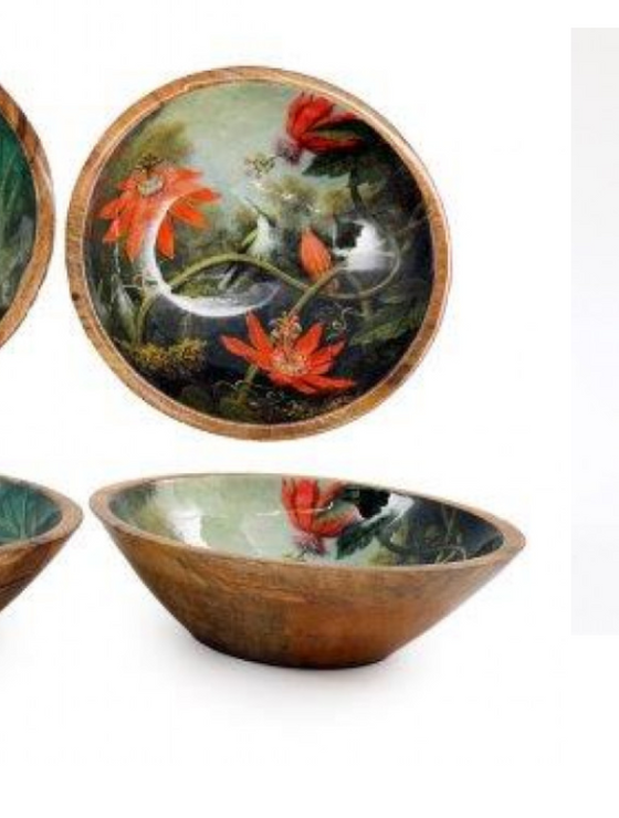 Decorative bowls with floral and bird designs on a white background